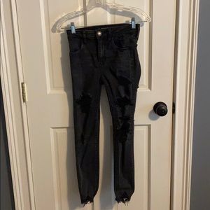 black ripped American Eagle skinny jeans